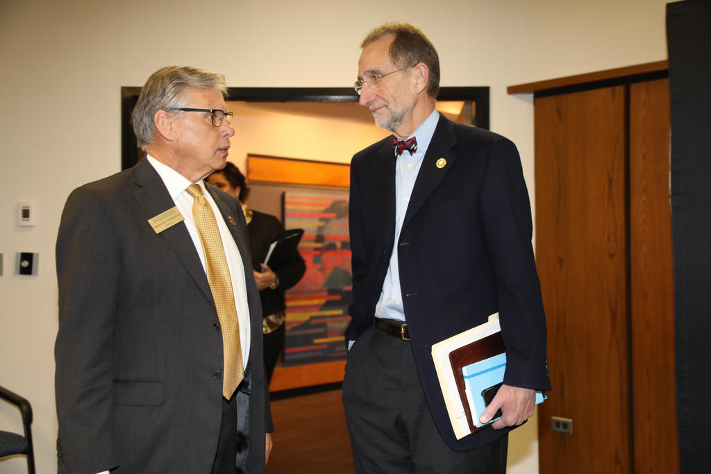 gages with UNC System Interim President Bill Roper during a campus visit on Friday, March 6