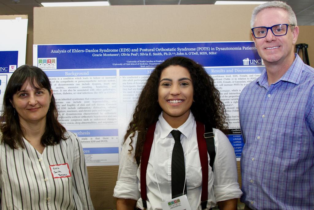 Left to right: Dr. Silvia Smith, Gracie Montanez, and Dr. John O'Dell