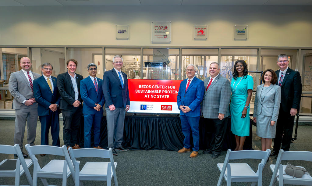 (left to right) Dr. Jim Pfaendtner, NC State, Dr. Robin Gary Cummings, UNCP Chancellor, Andy Jarvis, The Bezos Earth Fund, Dr. Rohan Shirwaiker, NC State, Dr. Andrew Steer, president/CEO of the Bezos Earth Fund, Dr. Randy Woodson, NC State Chancellor, Dr. William Aimutis NC Food Innovation Lab, Dr. Chavonda Jacobs-Young, USDA, Toni Bucci, Sable Fermentation, Dr. Garey Fox, NC State
