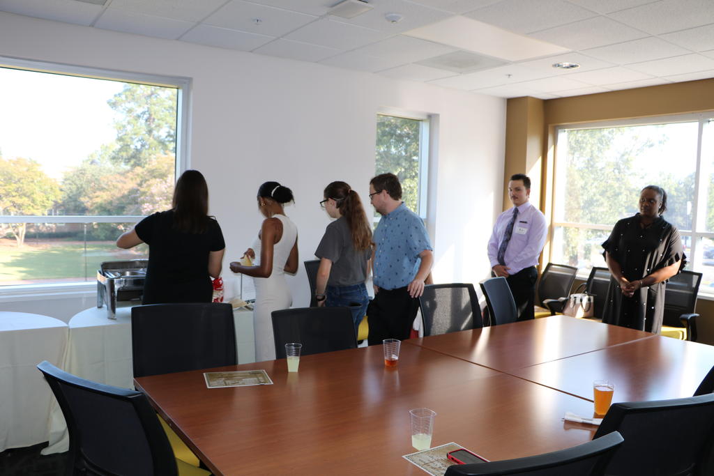 Photo of scholarship winners having dinner