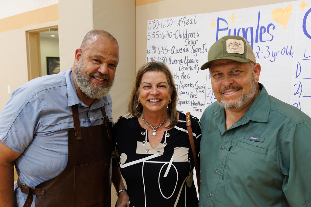 Volunteers Pat Dial and Gary Strickland Jr. with First Lady Rebecca Cummings