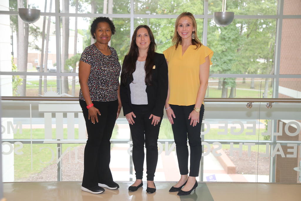 Dr. Jackie Davis, left, Dr. Summer Woodside and Kresa Cummings