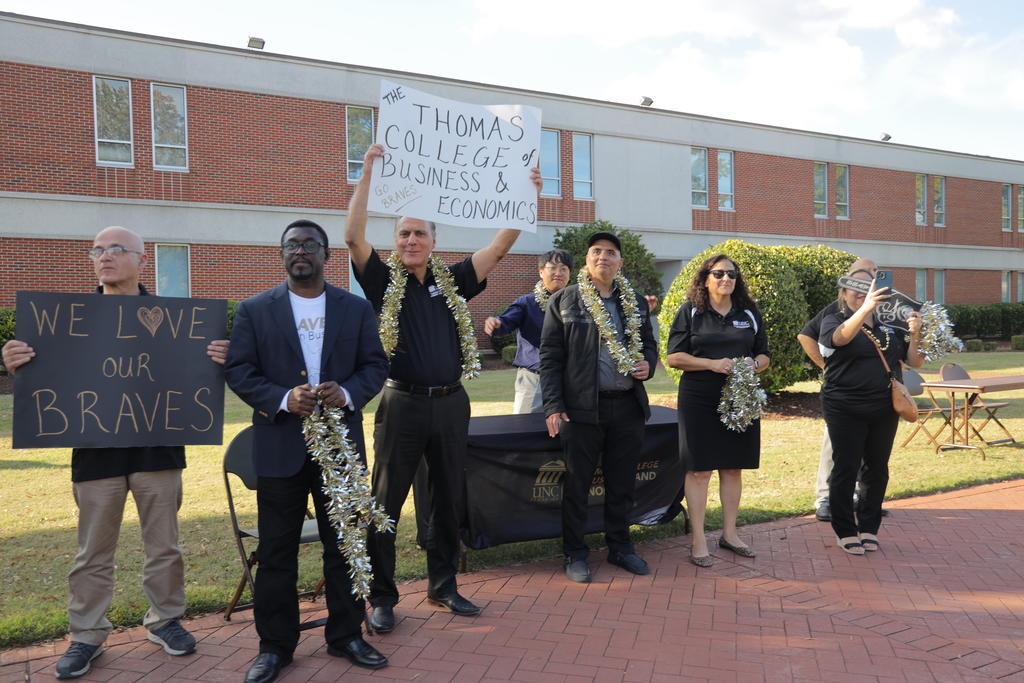 UNCP Thomas College of Business & Economics viewing party during the parade