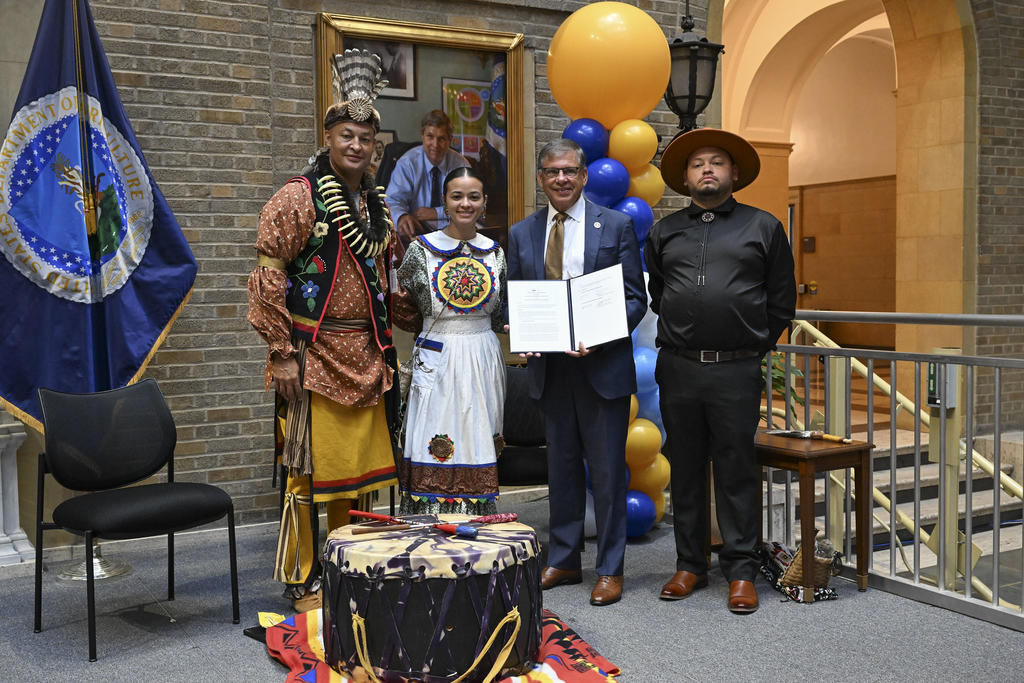 John Oxendine (left), UNCP alumnus Taylor Davis, UNCP Chancellor Robin Gary Cummings and Brarick Locklear