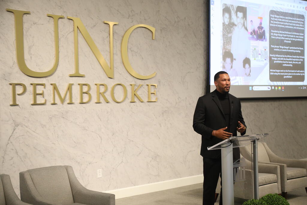 Alumnus Micheal Robinson, owner of Bingo-Bango Fresh Fruit Soda, served as keynote to kick off Global Entrepreneurship Week at UNCP