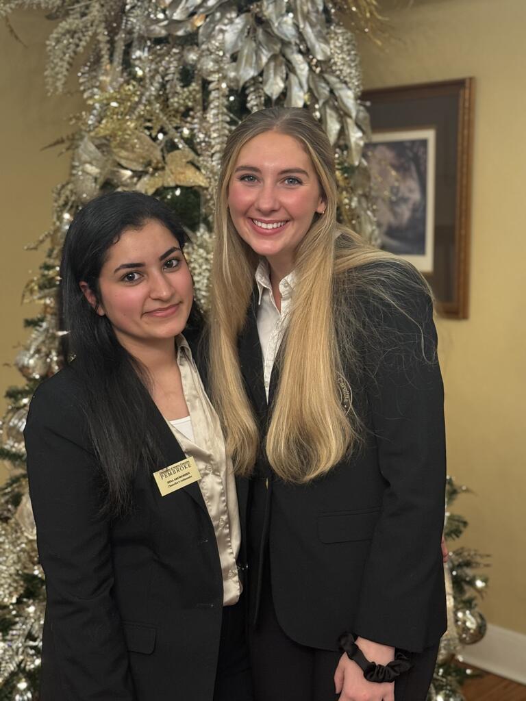 Lindsay Branch, right, formed lasting friendships, including fellow graduate Dina Abumohsen, during her time at UNCP, including a close