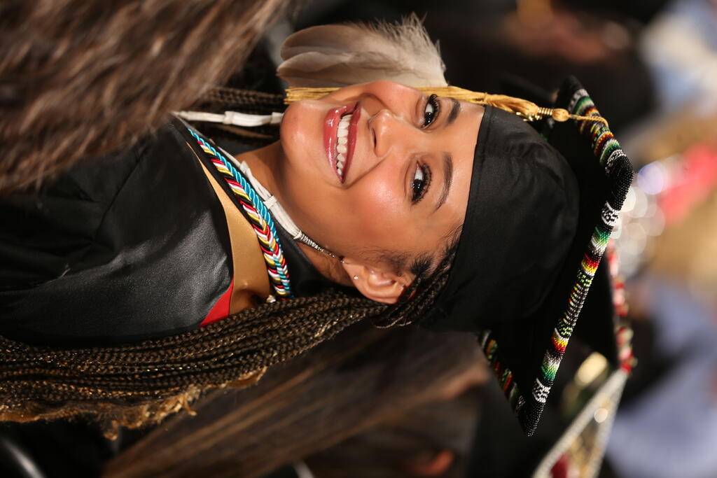 Kaloni Walton flashes a smile during Winter Commencement on Saturday, December 14, 2024