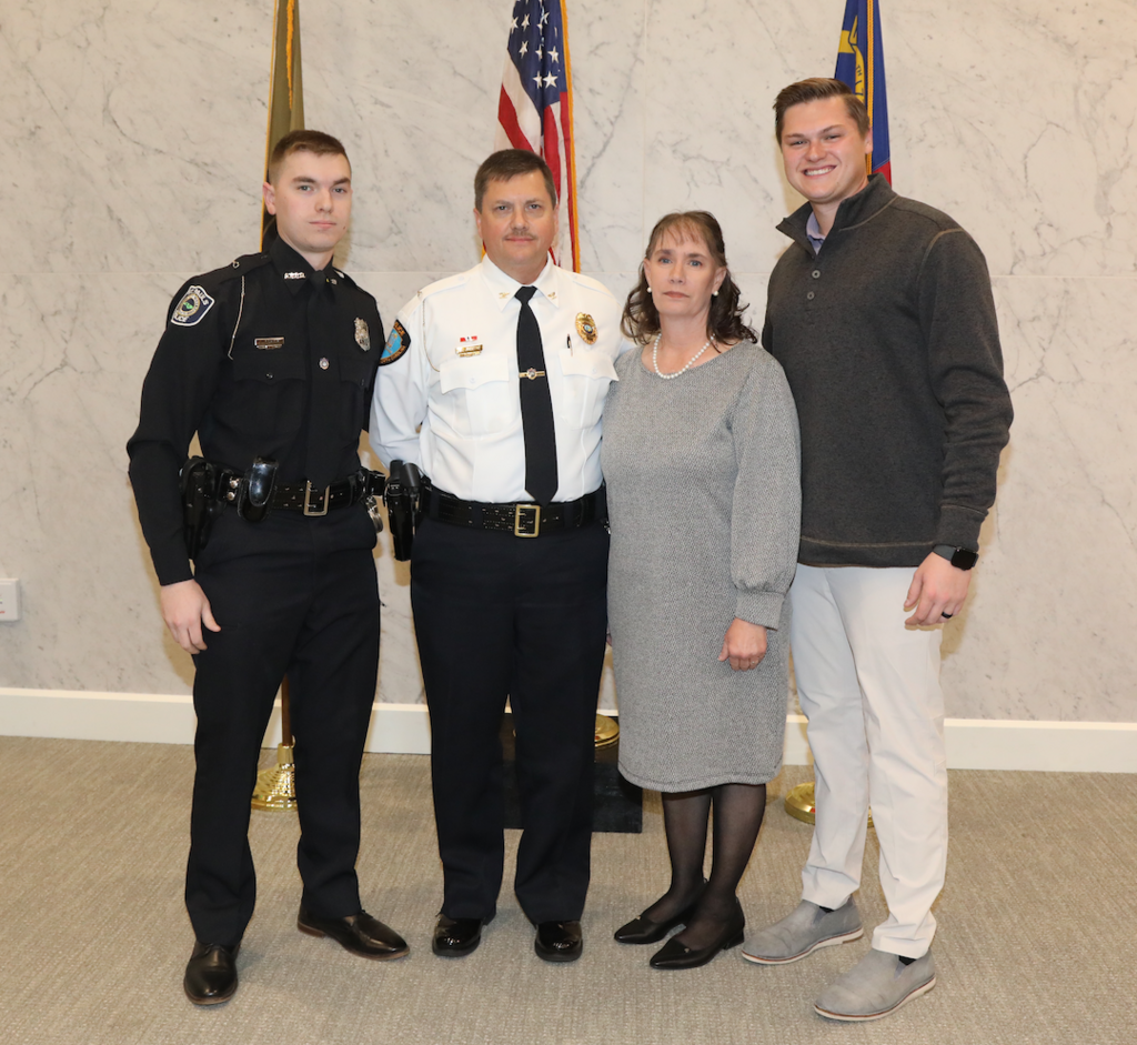 Chief Earl Johnson (center) with his sons, Stephen Johnson (far left), wife, Sonya, and Adam Johnson