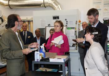 Dr. Ben Bahr (left) gives tour of Alzheimer's Disease Research Lab