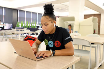 A student studying in the student center.