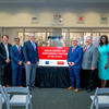 (left to right) Dr. Jim Pfaendtner, NC State, Dr. Robin Gary Cummings, UNCP Chancellor, Andy Jarvis, The Bezos Earth Fund, Dr. Rohan Shirwaiker, NC State, Dr. Andrew Steer, president/CEO of the Bezos Earth Fund, Dr. Randy Woodson, NC State Chancellor, Dr. William Aimutis NC Food Innovation Lab, Dr. Chavonda Jacobs-Young, USDA, Toni Bucci, Sable Fermentation, Dr. Garey Fox, NC State